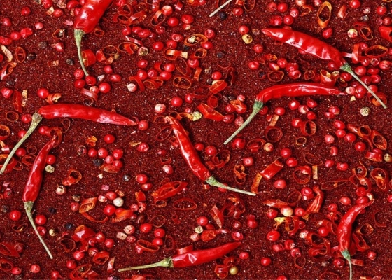 Los chiles rojos machacados picantes calientes sazonan la malla 120 ASTA del polvo con pimienta 60